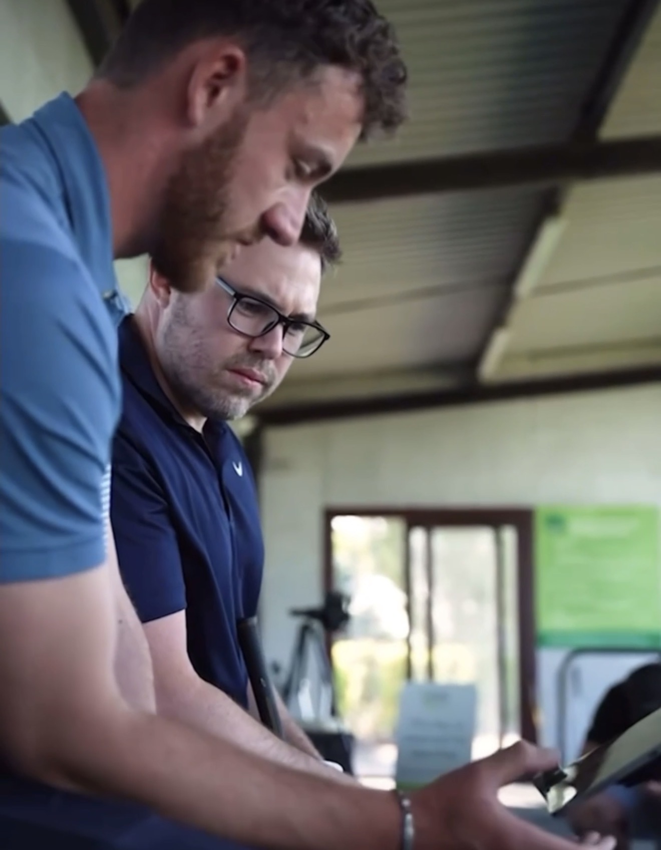 Reviewing swing footage together